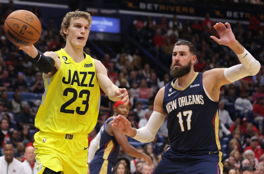 NEW ORLEANS, LOUISIANA - OCTOBER 23: Lauri Markkanen #23 of the Utah Jazz drives against Jonas Valanciunas #17 of the New Orleans Pelicans during the first half of a game at the Smoothie King Center on October 23, 2022 in New Orleans, Louisiana. NOTE TO USER: User expressly acknowledges and agrees that, by downloading and or using this Photograph, user is consenting to the terms and conditions of the Getty Images License Agreement. (Photo by Jonathan Bachman/Getty Images)