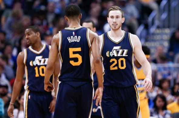 Apr 10, 2016; Denver, CO, USA; Utah Jazz forward Gordon Hayward (20) celebrates with guard Rodney Hood (5) after a play in the third quarter against the Denver Nuggets at the Pepsi Center. The Jazz defeated the Nuggets 100-84. Mandatory Credit: Isaiah J. Downing-USA TODAY Sports